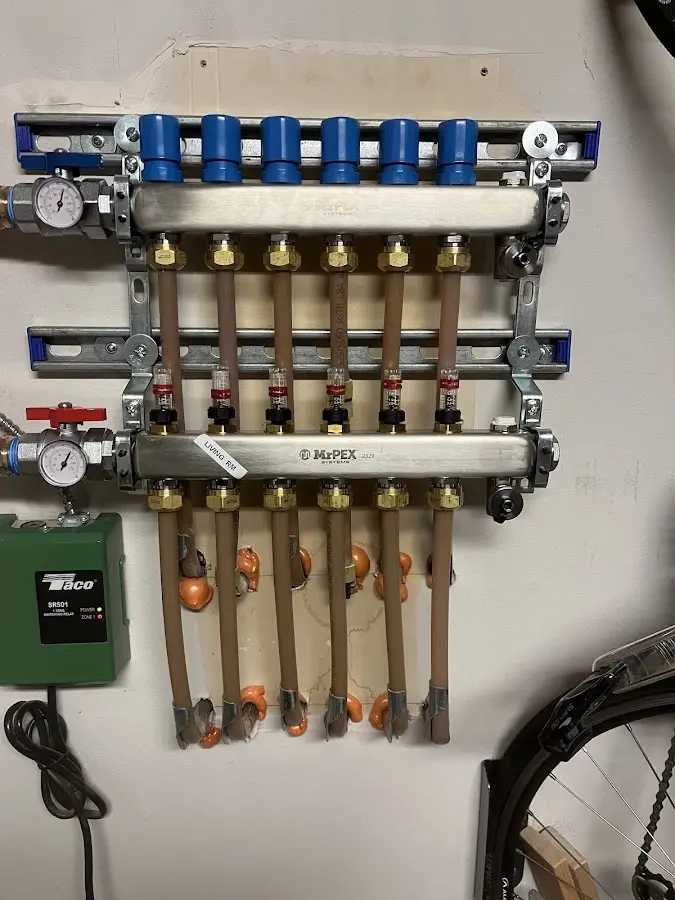 Plumber performing Gas Line Installation at a residential property in Groton